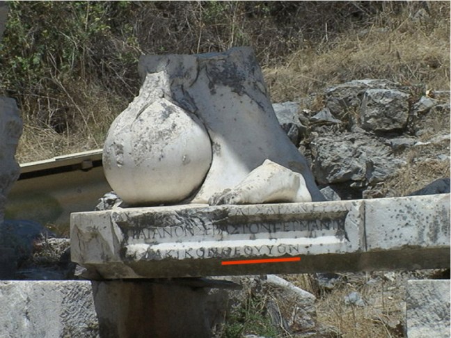 This close up shows a Greek inscription under the statue of Trajan which stated among other things that he was regarded as “son of god.”  © copyright holder of this work is Richard E. Oster.  Page 40, figure 28.