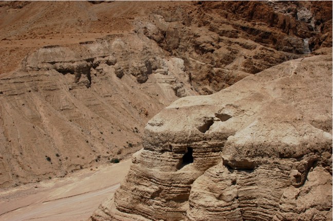 Panorama photo of the wadi, the cliff, and cave 4 at Qumran.  © copyright holder of this work is Richard E. Oster.  Page 87, figure 49.
